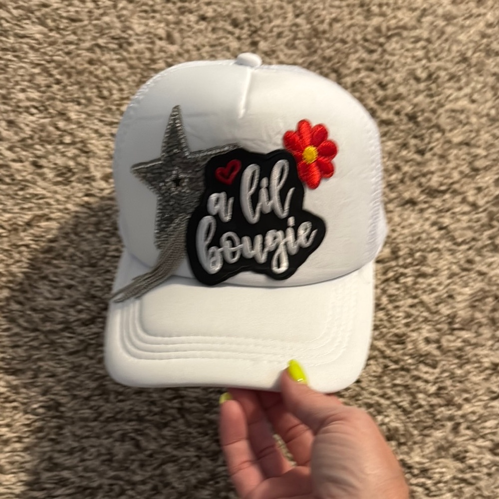White Custom Cap with Silver Star and Red Flower.  Wore for 30 mins